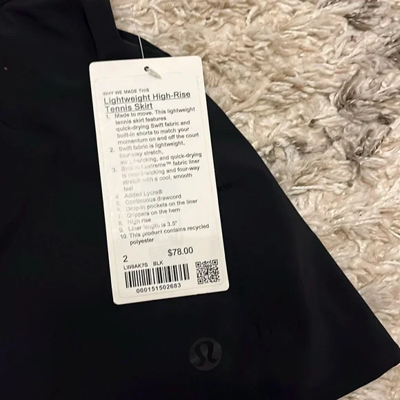 Lululemon lightweight high-rise tennis skirt. Size 2. New with tag. Black.